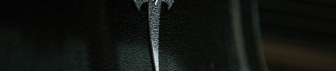 black and gray nike logo